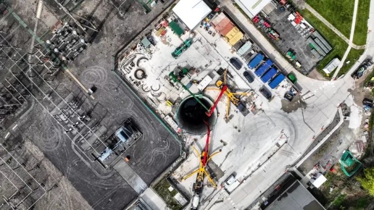 An aerial view of a power tunnel construction site.